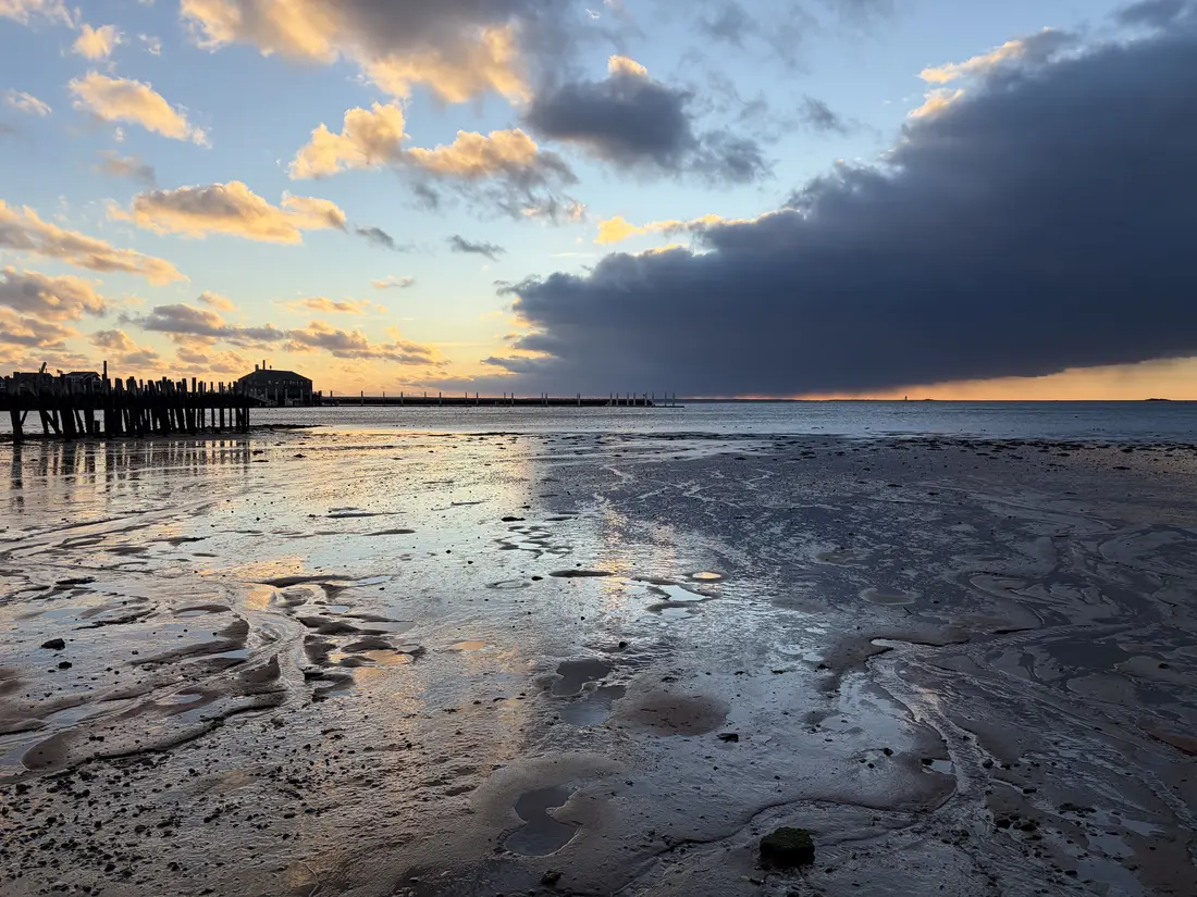 Low tide and sunset clouds over Provincetown Harbor