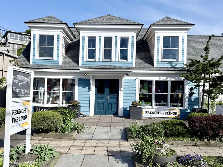 Blue exterior of Ptown Perch at 220 Commercial Street with its current grey shingle roof